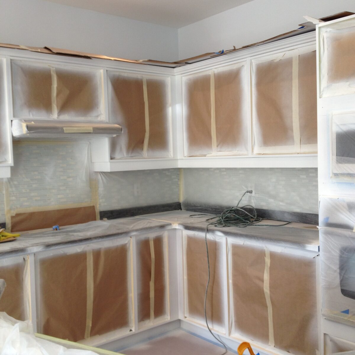 Spray Painting Kitchen Base Cabinets, Kick Plates, Crowns & Gable Ends.
